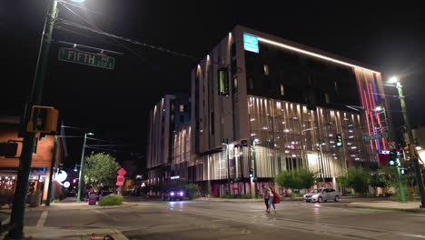 AC-Hotel-By-Marriott-Tucson-Downtown-At-Night-With-Pedestrians-And-Traffic-In-Foreground