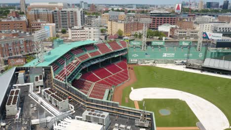 Flying-Away-from-Fenway-Park-in-Downtown-Boston,-Massachusetts