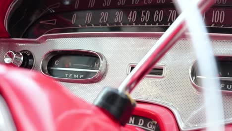 Dashboard-details-of-1958-Chevrolet-Chevy-Impala-pink-car