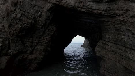 Aerial-fly-through-of-an-ocean-cave