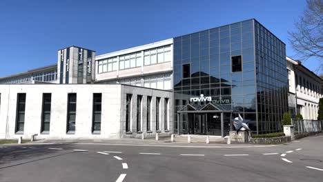 Panning-shot-of-Roviva-headquarters-building-in-Wangen-an-der-Aare,-Switzerland