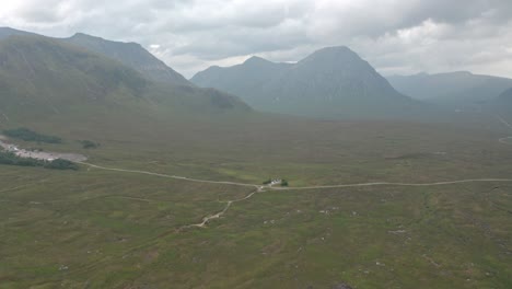 Dolly-forward-drone-shot-towards-tall-Scottish-mountains