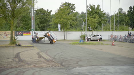 Stuntman-Comes-Out-Of-The-Window-While-Car-Performs-Side-Wheelie