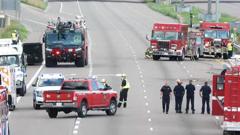Fire-Trucks-And-Firefighters-On-Guard-At-The-Road-Near-The-Incident-Of-An-Oil-Tanker-Accident-In-Brampton,-Canada