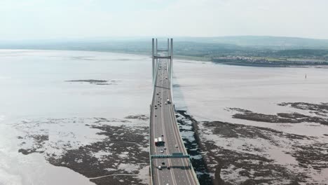 Head-on-dolly-back-drone-shot-of-Prince-of-wales-Bridge-Severn-Estuary