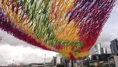 River-of-light-art-installation-by-Poetic-Kinetics-in-downtown-Hong-Kong,-composed-of-over-45000-pieces-of-sailcloth