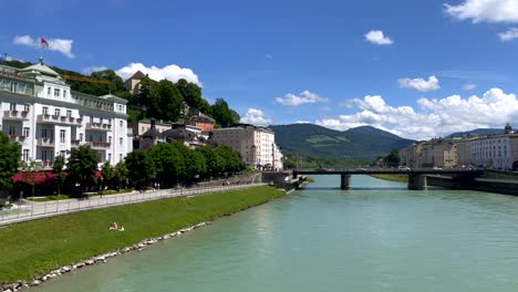 Panning-shot-of-beautiful-cityscape-with-Salzach-river-and-castle-in-Salzburg,4k