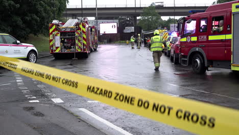 Fire-engines-arrive-at-a-command-centre-for-flooding-after-a-month’s-worth-of-torrential-rain-falls-in-several-hours-across-the-capital-during-thunderstorms