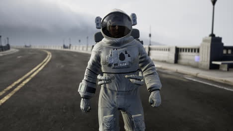 astronaut-in-space-suit-on-the-road-bridge