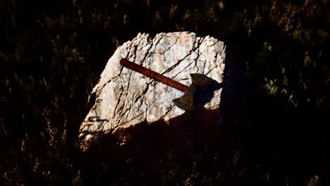 war-ax-for-Viking-on-the-rock-at-sunset
