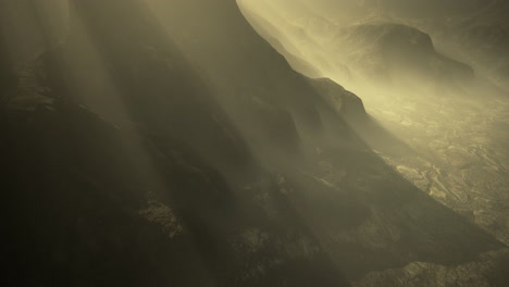 black-mountains-in-deep-fog