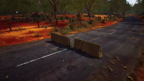 old-rusted-concrete-road-barrier-blocks