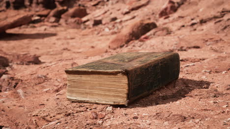 old-book-in-red-rock-desert