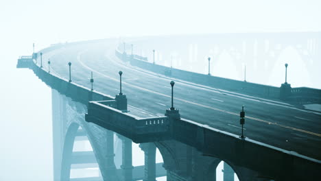 Old-empty-stone-bridge-on-a-foggy-day