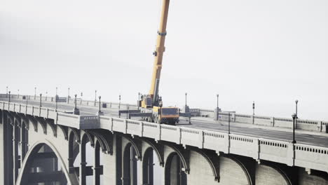 big-auto-crane-on-the-bridge-under-constraction