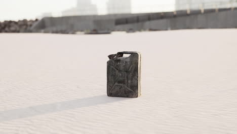 old-rusted-fuel-can-on-the-beach