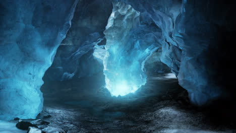 blue-ice-cave-covered-with-snow-and-flooded-with-light