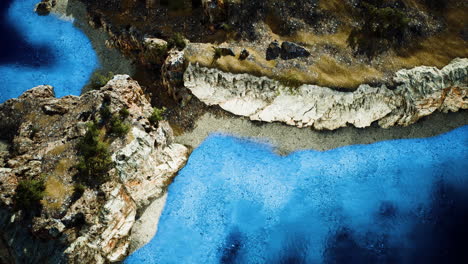aerial-view-from-flying-drone-of-rocky-island-in-Atlantic-ocean