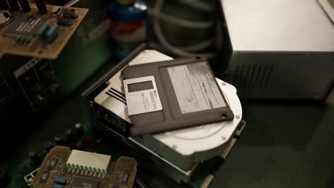 old-computer-floppy-disk-and-motherboard