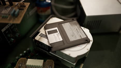 old-computer-floppy-disk-and-motherboard