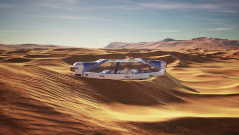 futuristic-glass-building-in-desert-dunes