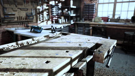 Retro-stylized-old-tools-on-wooden-table-in-a-joinery
