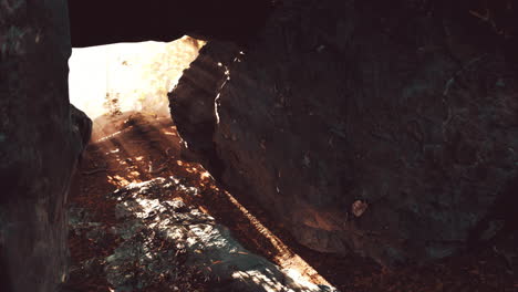 Empty-road-goes-through-the-cave-with-glowing-end