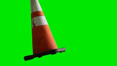 orange-traffic-cone-placed-at-green-chromakey-background