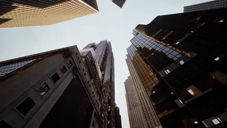 Looking-Up-Manhattan-Skyscrappers-With-skies
