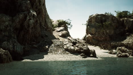 coastal-view-of-a-sand-beach-with-cliffs