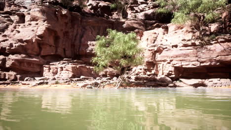landscape-with-red-sandstone-rock-and-river