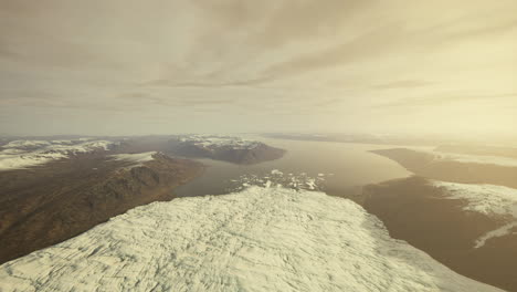 Hermosa-Vista-Aérea-Del-Enorme-Glaciar-En-Islandia-Y-Su-Laguna