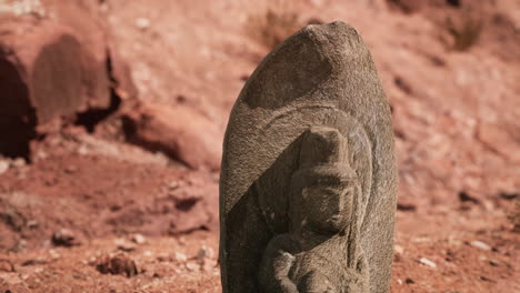 Ancient-Statue-on-the-Rocks-Desert