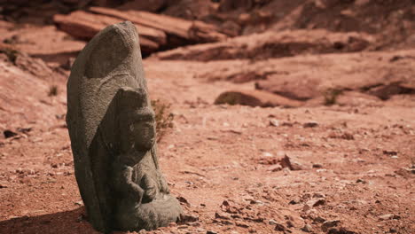 Ancient-Statue-on-the-Rocks-Desert
