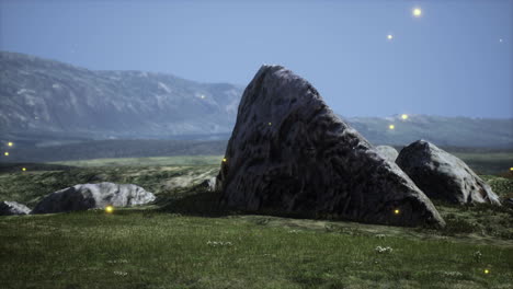 isolated-stone-on-meadow-in-mountains