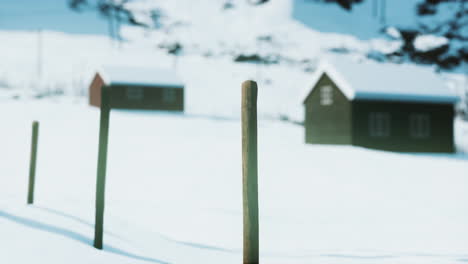 traditional-Norwegian-wooden-houses-under-the-fresh-snow
