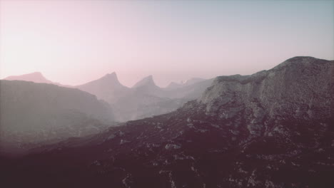 Rocks-and-mountains-in-deep-fog