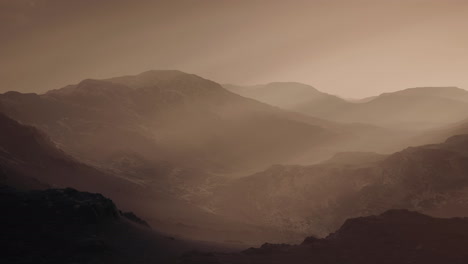 black-rocky-mountain-silhouette-in-deep-fog
