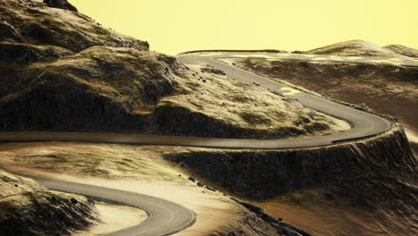 Empty-winding-road-through-the-valleys-and-hills