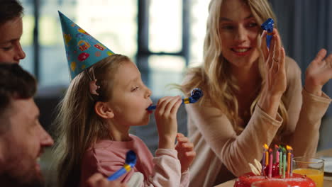 Family-enjoying-virtual-party.-Parents-siblings-celebrating-birthday-online.