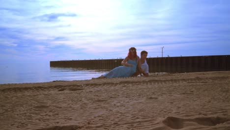 Love-couple-lying-on-sea-beach.-Romantic-couple-beach.-Love-couple