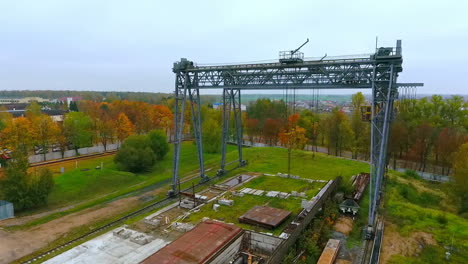 Aerial-view-rail-crane-at-industrial-factory.-Sky-view-industrial-crane