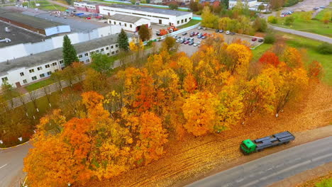 Autumn-view-of-buildings-road.-Autumn-road-near-industry-buildings