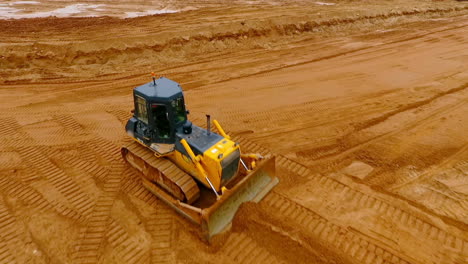 Mining-machinery.-Bulldozer-machine.-Aerial-view-of-crawler-bulldozer-mine-sand
