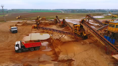 View-from-above-mining-conveyor-working-on-sand-mine.-Mining-equipment