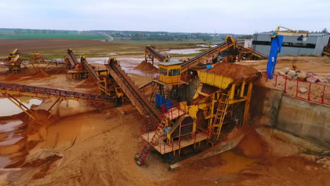 Mining-equipment-at-sand-mine-territory.-Mining-conveyor-at-sand-quarry