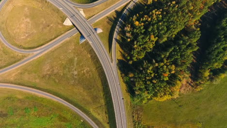 Road-intersection.-Aerial-view-of-cars-moving-on-highway-road-junction