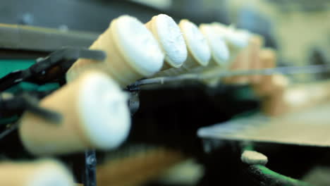 Ice-cream-production-line.-Row-of-ice-cream-on-conveyor-line.-Food-factory