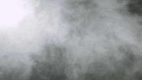 Smoke-background.-Abstract-smoke-cloud.-Smoke-in-slow-motion-on-black-background