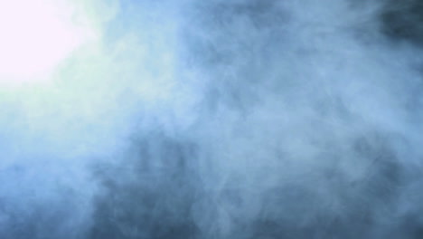 Smoke-background.-Abstract-blue-smoke-cloud.-Smoke-on-black-background